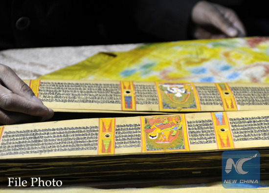 Photo taken on Nov. 21, 2012 shows the Palm-Leaf Manuscripts of Buddhist Sutras in Lhasa, capital of southwest China's Tibet Autonomous Region. (Xinhua/Chogo)