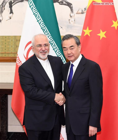 Chinese State Councilor and Foreign Minister Wang Yi (R) holds talks with Iranian Foreign Minister Mohammad Javad Zarif in Beijing, capital of China, May 13, 2018. (Xinhua/Shen Hong)