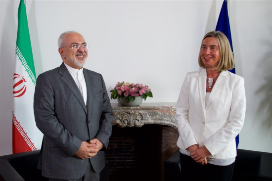 European Union (EU) foreign policy chief Federica Mogherini (R) meets with Iranian Foreign Minister Mohammad Javad Zarif in Brussels, Belgium, May 15, 2018. (Xinhua/European Union)
