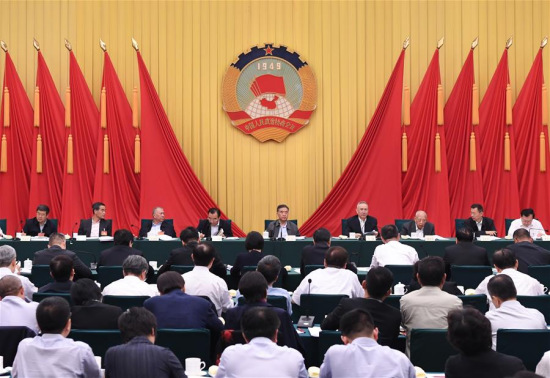 Wang Yang, member of the Standing Committee of the Political Bureau of the Communist Party of China Central Committee and chairman of the National Committee of the Chinese People's Political Consultative Conference (CPPCC), presides over a special consultative conference on improving the system for the prevention of systemic financial risks in Beijing, capital of China, on May 15, 2018. (Xinhua/Shen Hong)