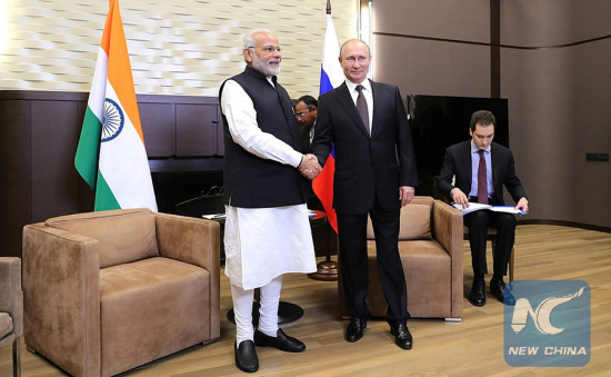 Russian President Vladimir Putin shakes hands with visiting Indian Prime Minister Narendra Modi in Sochi, Russia, May 21, 2018. (Kremlin Photo)
