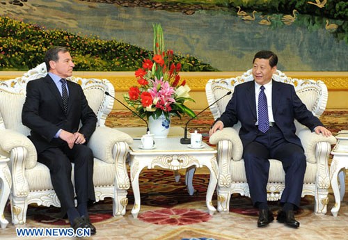 Chinese Vice President Xi Jinping (R) meets with Robert Iger, chairman and chief executive officer of the Walt Disney Company, in Beijing, capital of China, April 25, 2012. (Xinhua/Liu Jiansheng)