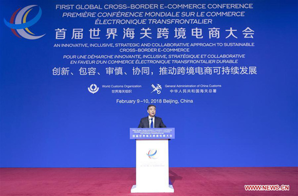 Chinese Vice Premier Wang Yang, also a member of the Standing Committee of the Political Bureau of the Communist Party of China (CPC) Central Committee, delivers a speech at the first Global Cross-border E-commerce Conference in Beijing, capital of China, Feb. 9, 2018. (Xinhua/Wang Ye)