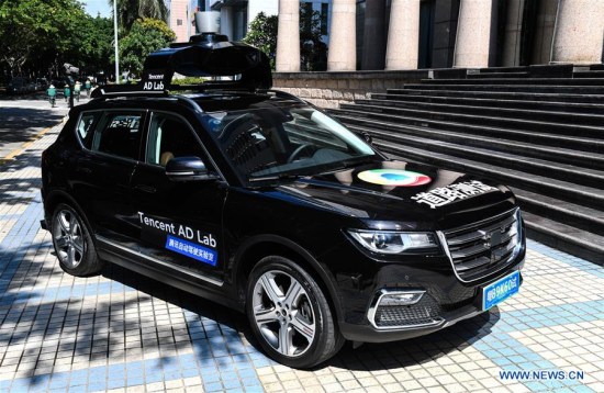 Photo taken on May 14, 2018 shows a self-driving vehicle for road testing in Shenzhen, south China's Guangdong Province.Tencent Monday received a government permit to test its self-driving car on certain public roads in the southern Chinese city of Shenzhen. (Xinhua/Mao Siqian)