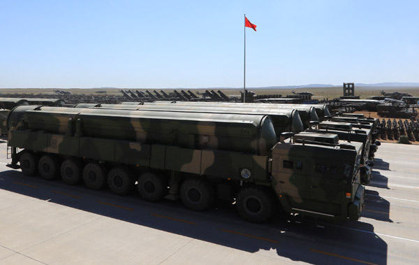 Intercontinental ballistic missiles currently in service are displayed during a military parade in September. These missiles are designated DF-31AG. (Photo/Xinhua)