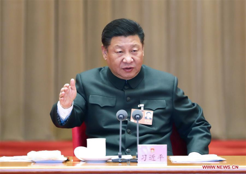 Chinese President Xi Jinping, also general secretary of the Communist Party of China (CPC) Central Committee and chairman of the Central Military Commission, speaks when attending a plenary meeting of the delegation of People's Liberation Army and armed police at the ongoing session of the 13th National People's Congress in Beijing, capital of China, March 12, 2018. (Photo/Xinhua)