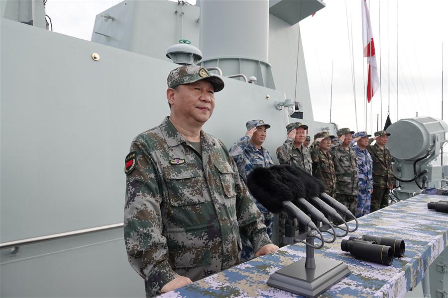President Xi reviews navy in South China Sea
