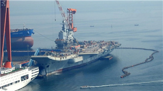 Helicopter maneuvers suggest China's new aircraft carrier ready for sea trials