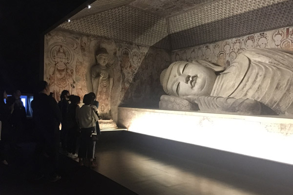 The ongoing show Mysterious Dunhuang, at a temporary exhibition space in Nanshan district in Shenzhen, features reconstructions of individual caves of the Mogao Grottoes. It lets visitors appreciate the art in detail and provides an immersive experience via cutting-edge technology. (Photo provided to China Daily)