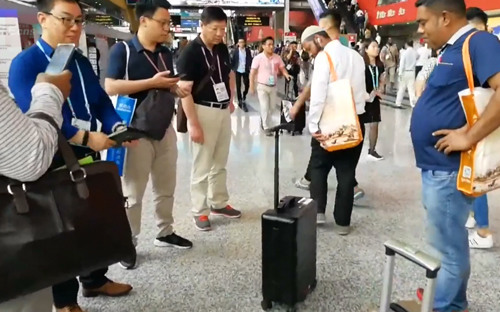Smart suitcase follows its owner automatically