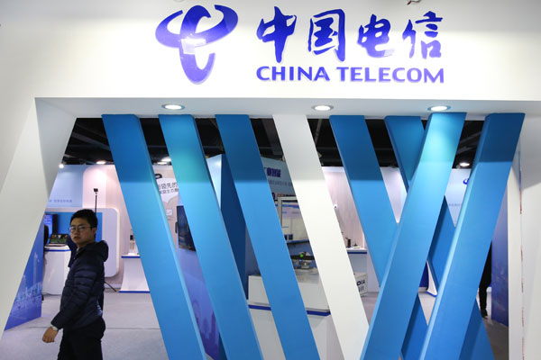 The booth of China Telecommunications Corp is seen at an industry expo in Nantong, East Chinas Jiangsu province. (Photo by Xu Congjun/For China Daily)